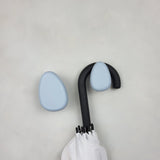 Wall mounted light blue hooks for children room 