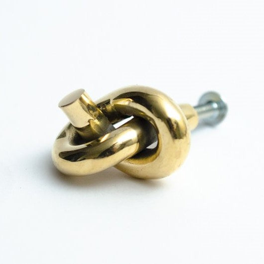 polished brass knob knot